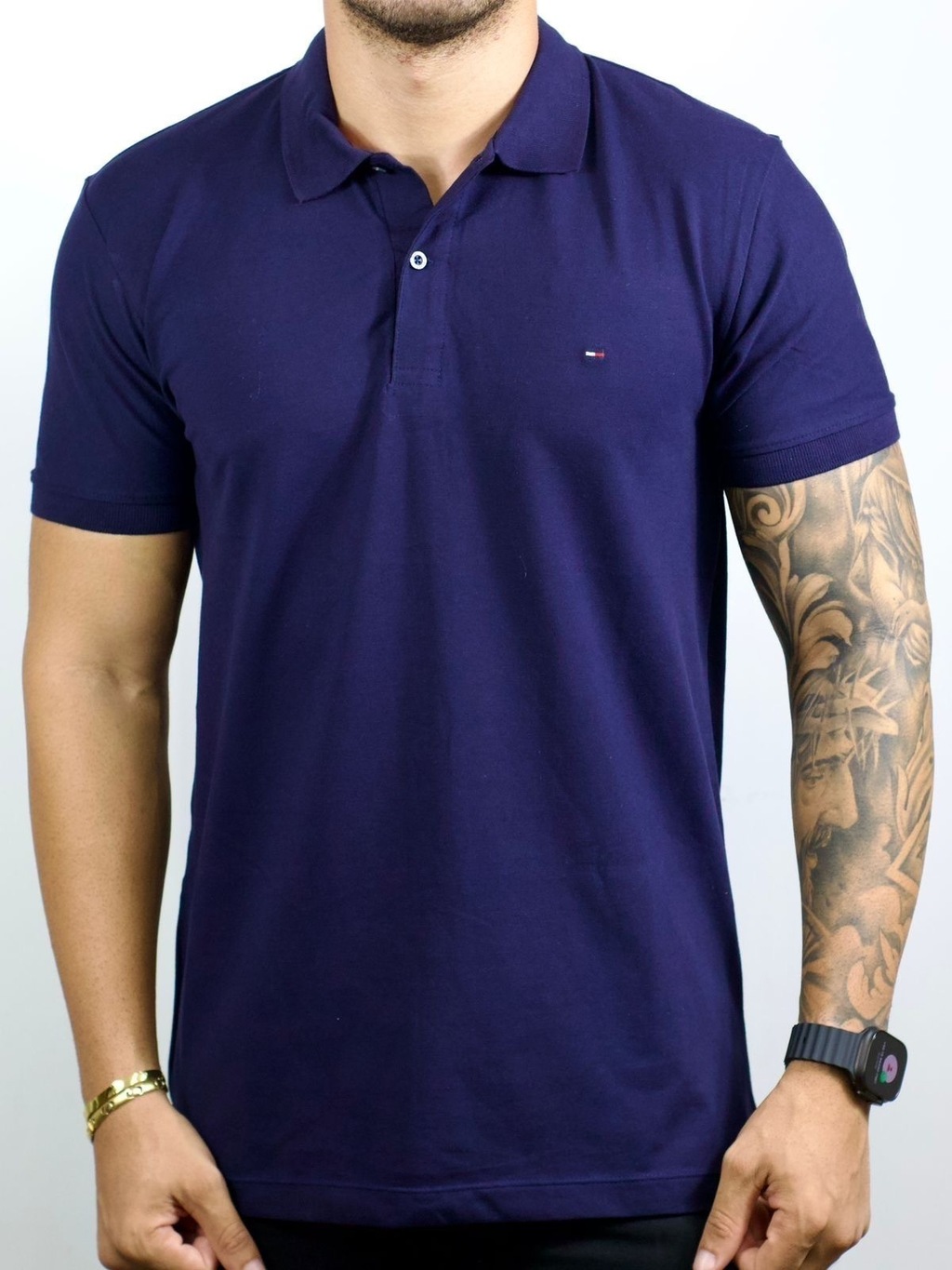ca4c1ed7-b464-4d28-8e75-cb64eb195d57-46d81907cb358f988117737554750978-1024-1024 Polo Tommy Hilfiger - Tradicional Azul P - Imagem 1