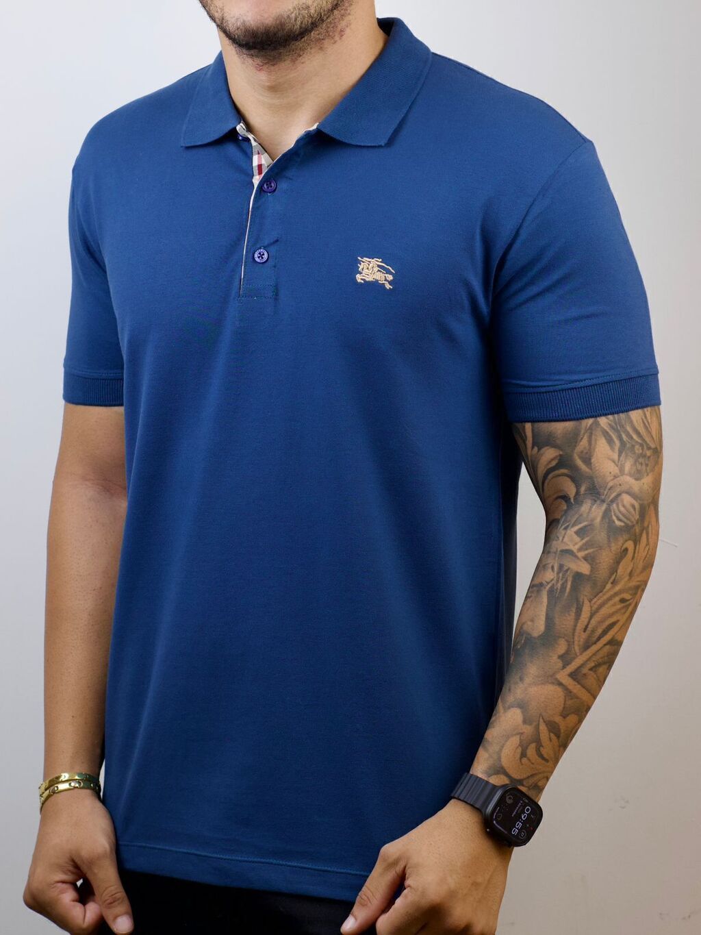 whatsapp-image-2026-04-03-at-11-36-40-4-575df0b1820c69bb3f17752648372625-1024-1024 Polo Burberry Azul P - Imagem 1